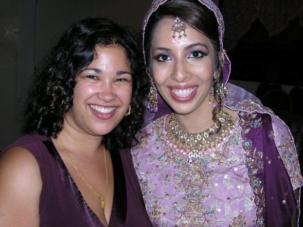 Picture of two women smiling. Felicia on the left and her friend Huma on the right.
